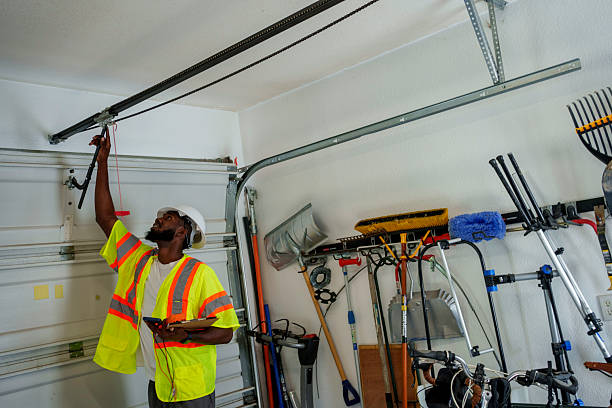 Professional Garage Door technician working in Caldwell, TX